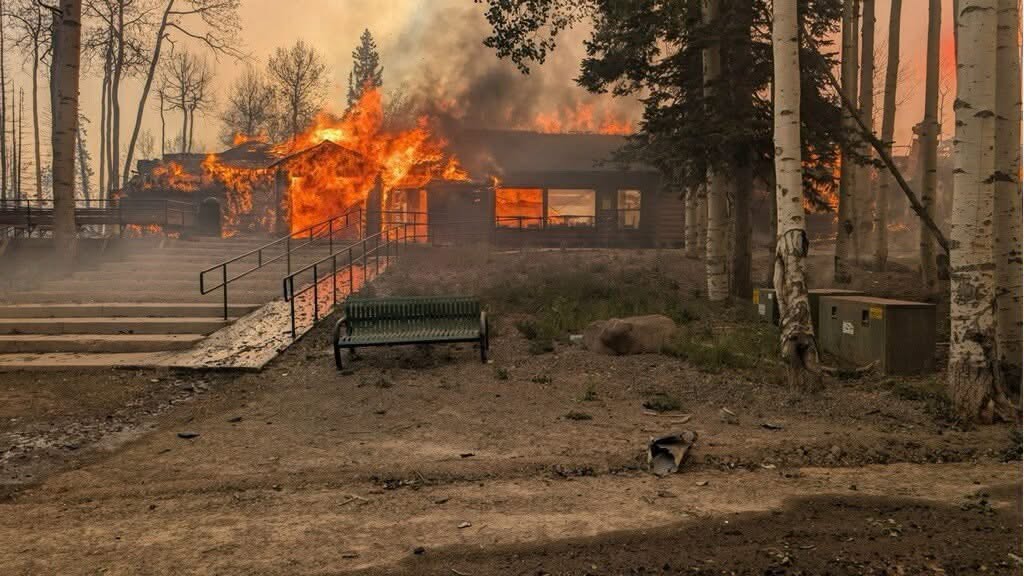 The devastating Cottonwood Fire destroying lower lodge at Eagle Point Ski Area