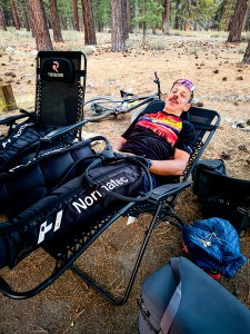 mountain biker enjoying PT Revolution's leg therapy after Rose to Toads