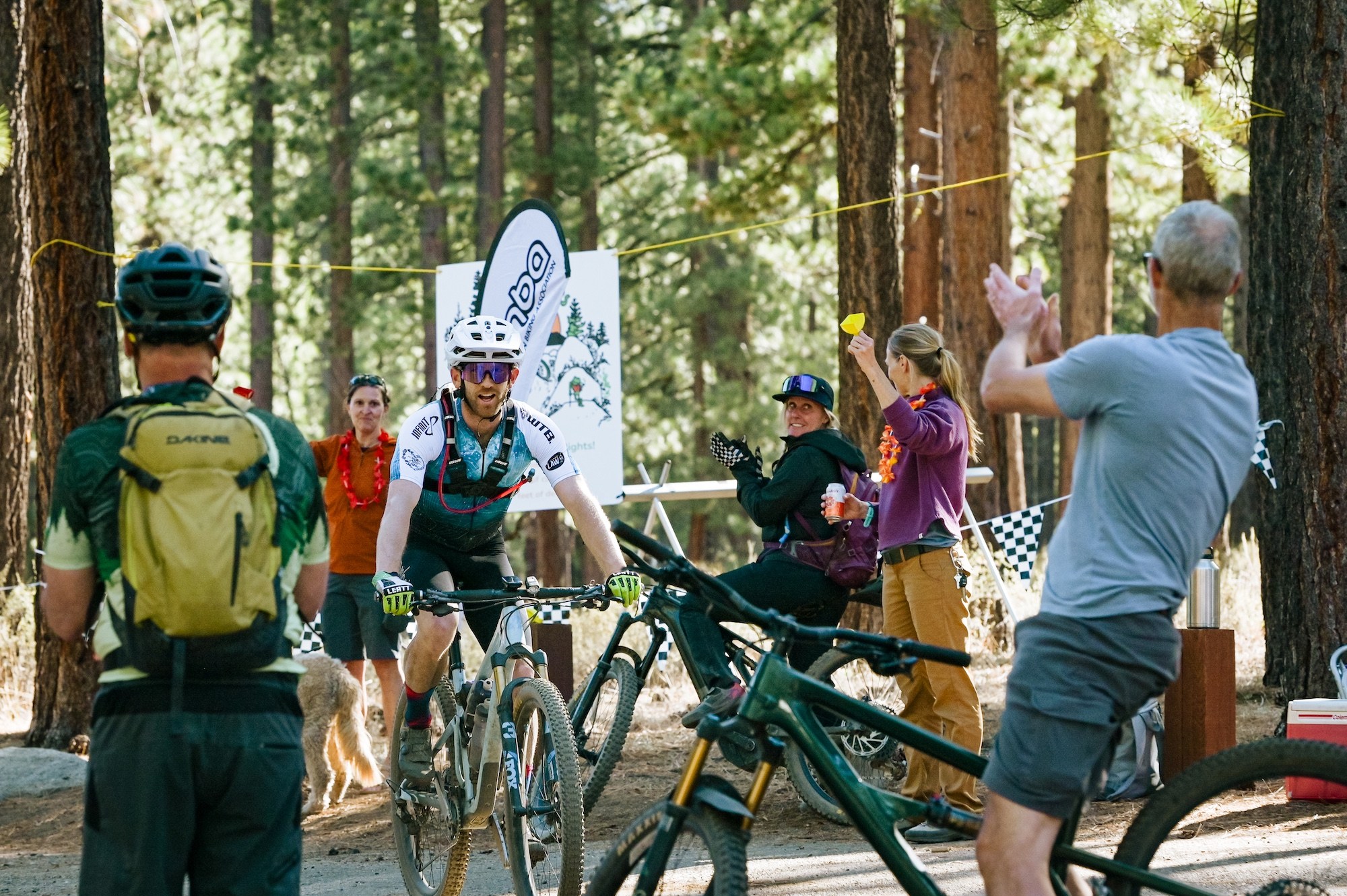 People celebrating the riders coming into the finish line at Rose to Toads 2026